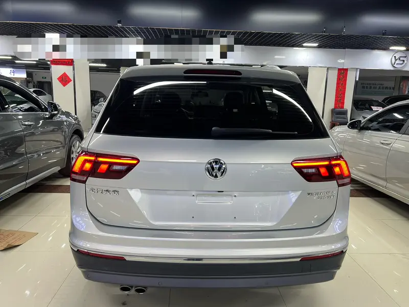 Volkswagen Tiguan L — фото 5