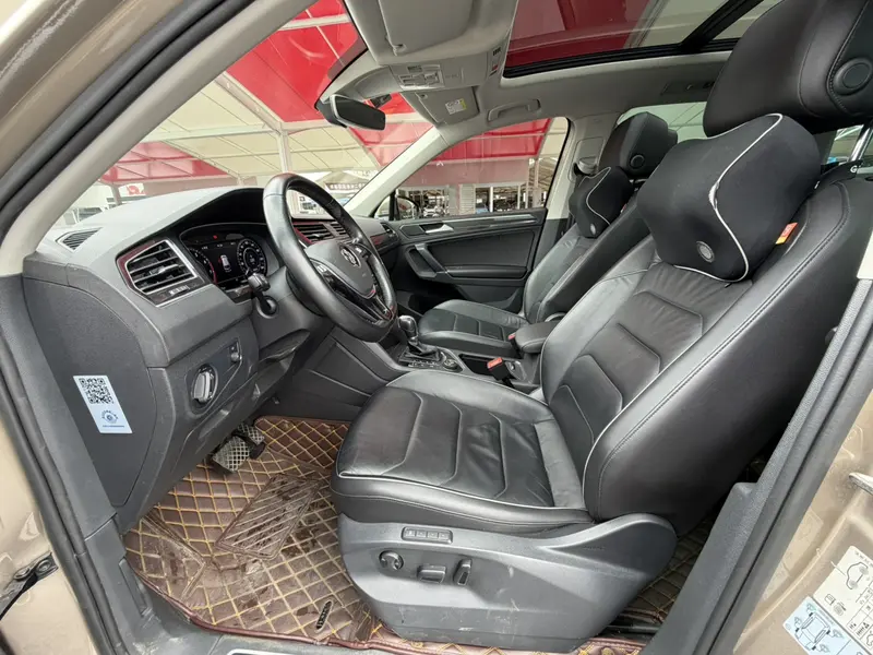 Volkswagen Tiguan — фото 11