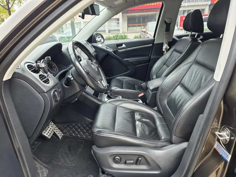 Volkswagen Tiguan — фото 11
