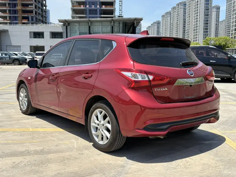 Nissan Tiida — фото 4