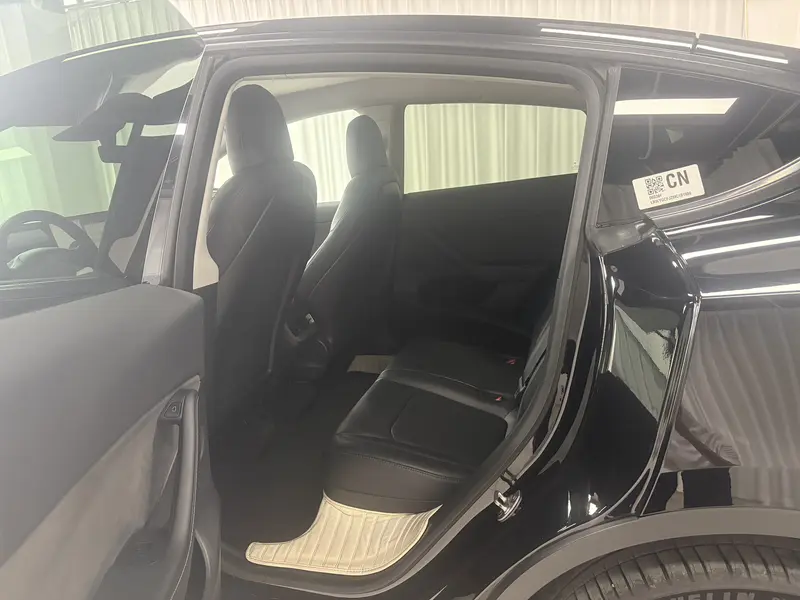 Tesla Model Y — фото 18