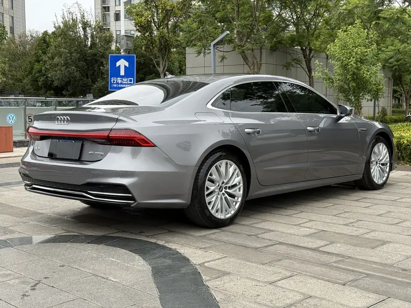 Audi A7L — фото 7