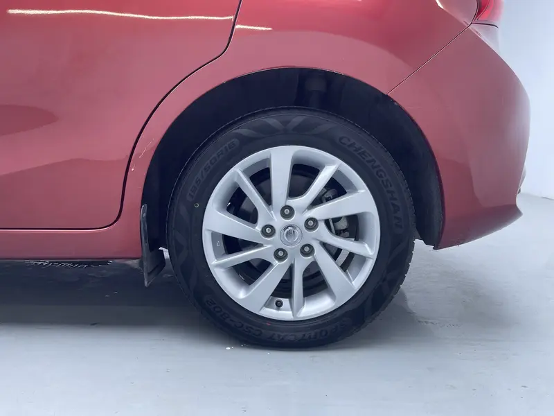 Nissan Tiida — фото 11