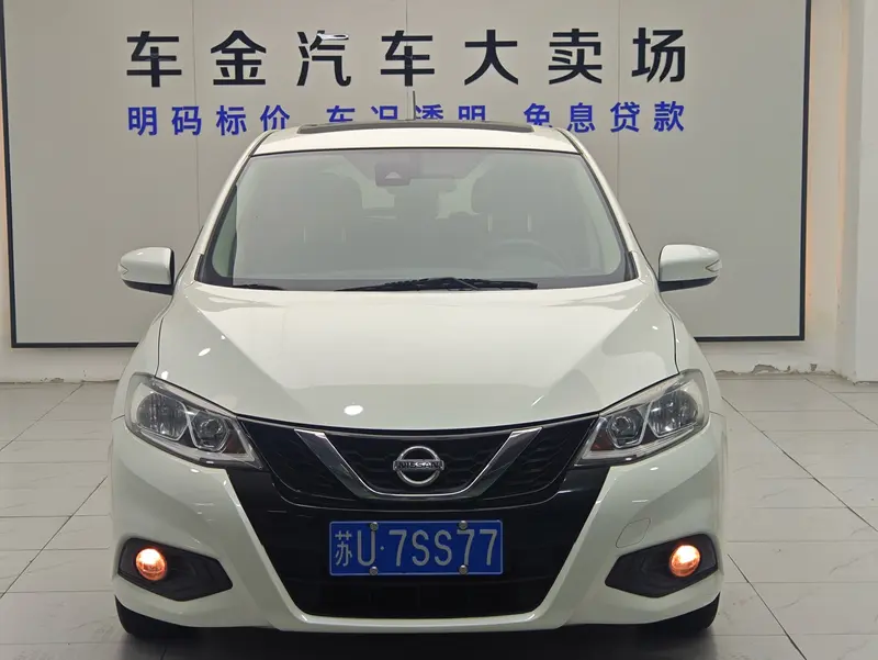 Nissan Tiida — фото 2
